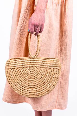 Half-moon wicker bag