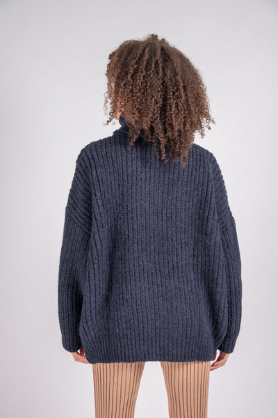 Mea turtleneck wrap in black eco wool