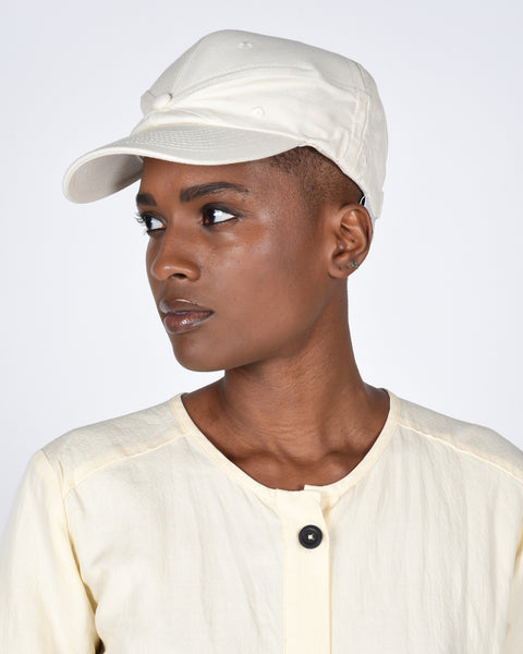 The new order cap in cream