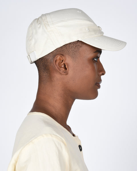 The new order cap in cream