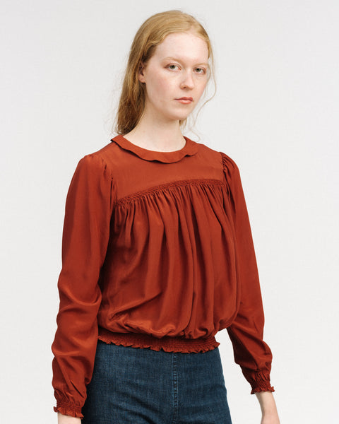 Rust silk blouse