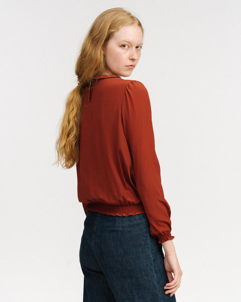 Rust silk blouse