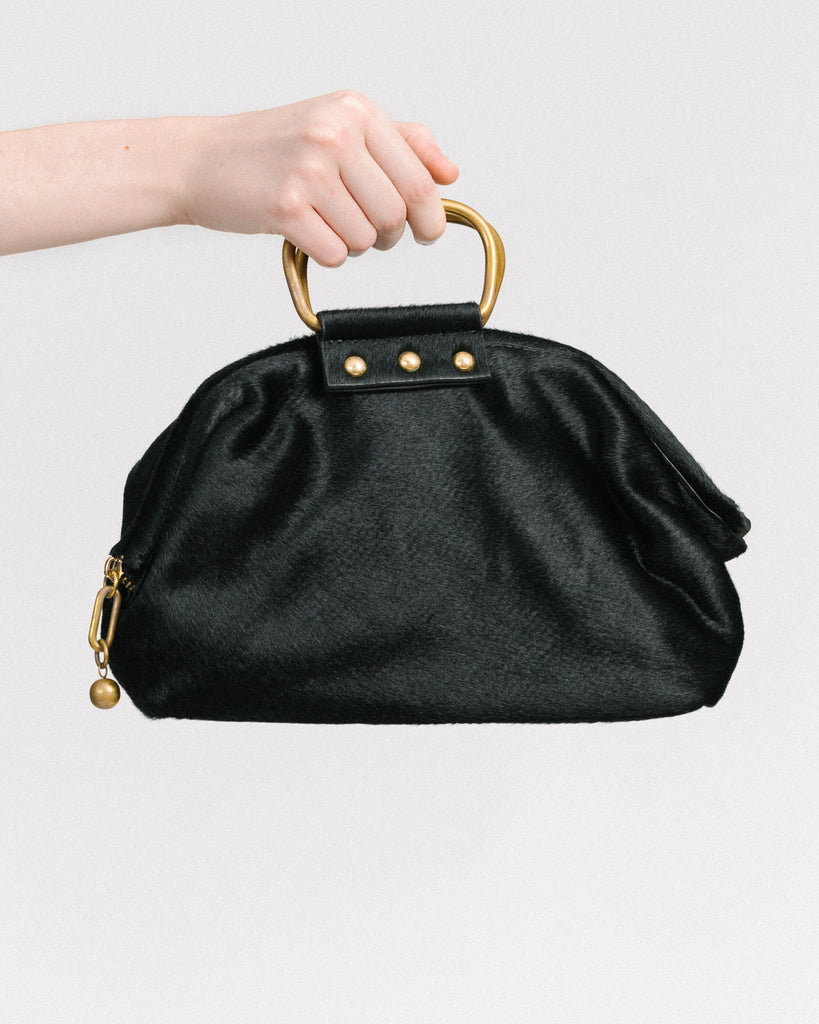 Puppy handbag in black haircalf