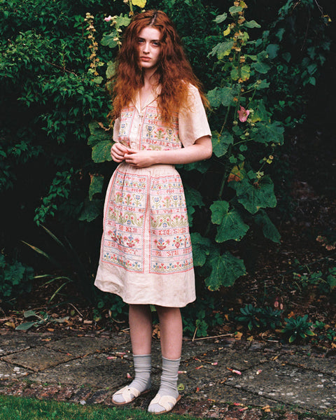 Sampler skirt in sampler embroidery