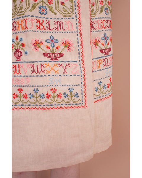 Sampler skirt in sampler embroidery