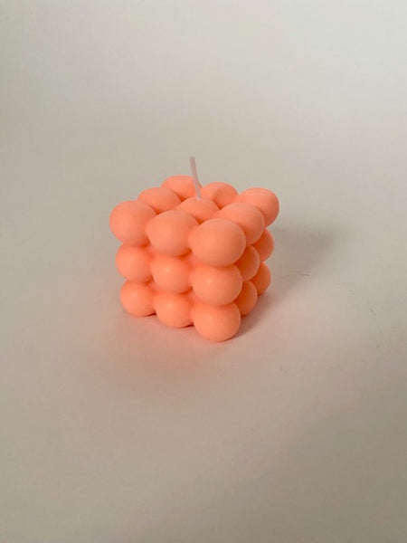 Atom Cube Candle in neon orange