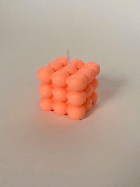 Atom Cube Candle in neon orange