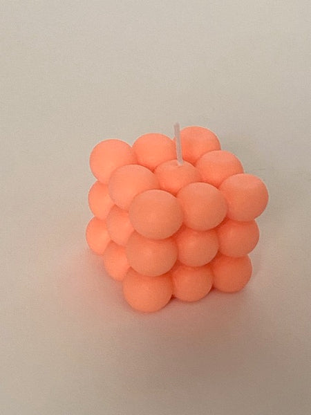 Atom Cube Candle in neon orange