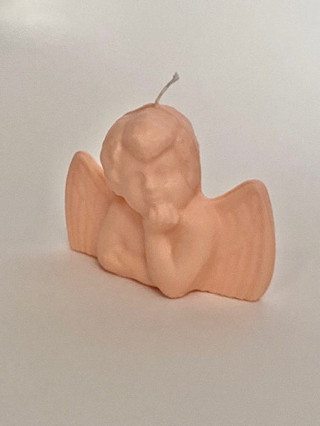 Cherub candle in peach