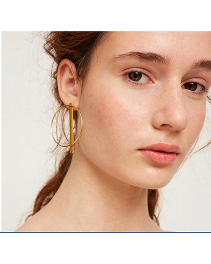 Bi-position circle and bar earrings in ochre